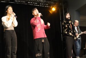 Part of The AC Wolfman Band performing "The Ordinary Road" (by Pu Shu). L-R: Yang, Xing, Liu and Qu.