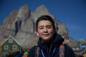 Picture of Ethan MacLeod, 15-years-old, outside of Uummannaq.