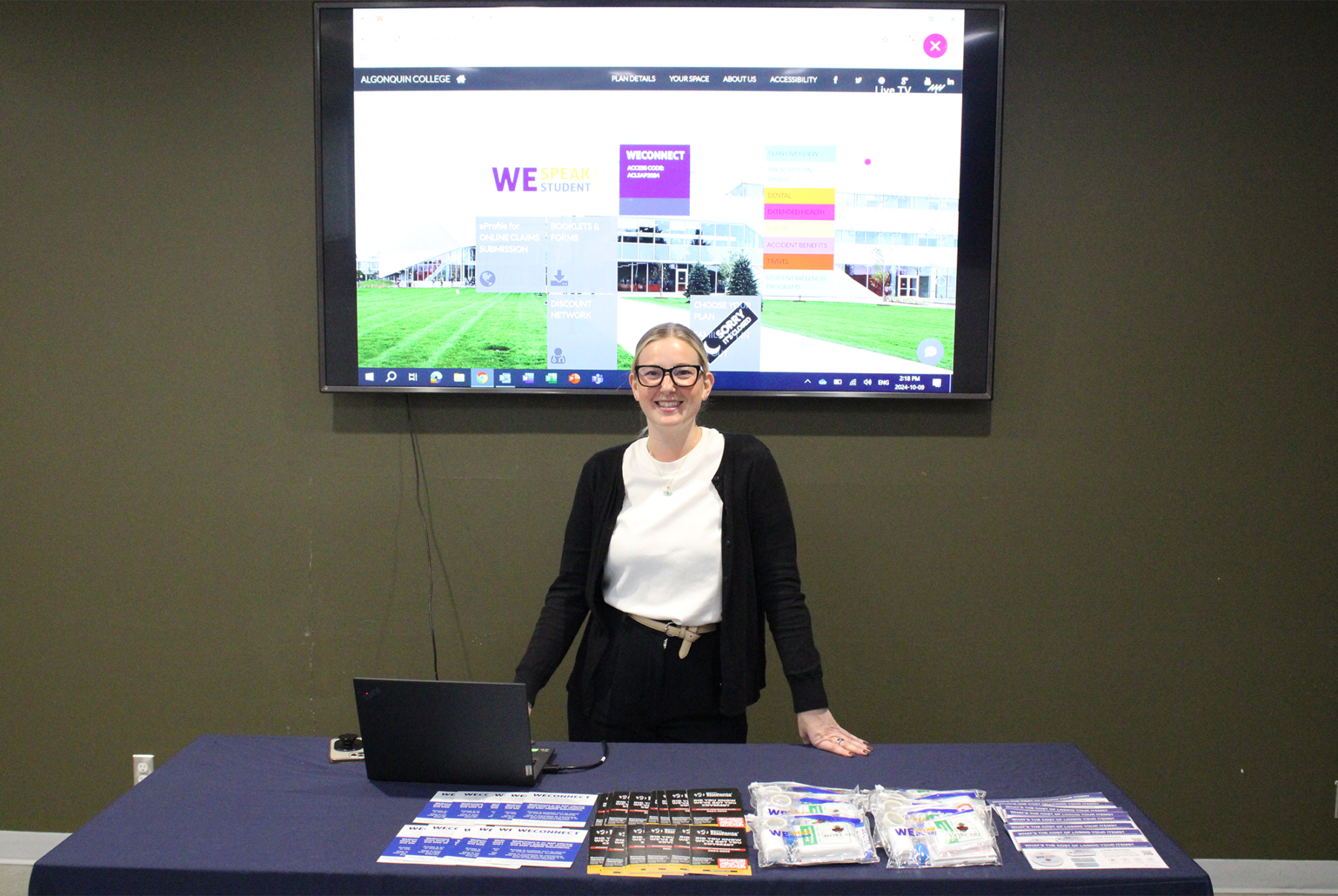 Kimberly Garrett stood behind a table ready to give a presentation to students at a health plan event on Oct. 9 in the E-building.