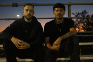 Bardhi Rrahmani and Alessandro Vivolo Algonquin Wolves soccer players sitting on the bleachers before practice