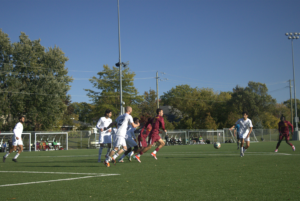 The Wolves and the Golden Shields run forward and defend the ball.