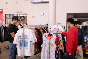 Students stopped in front of different booths to look for clothing they wanted: unique and affordable.