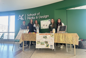 Veterinary technician students (from left to right) Liz Cervatos, Avery Beck, Jordy Vachon, Kylie Hughes and Mariana Lorandi at their information table in N-building on Oct. 17.