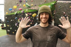 Kieran Ferren-Miller shows off some of his hard earned callouses after braving the advanced courses of the Arc rock wall.