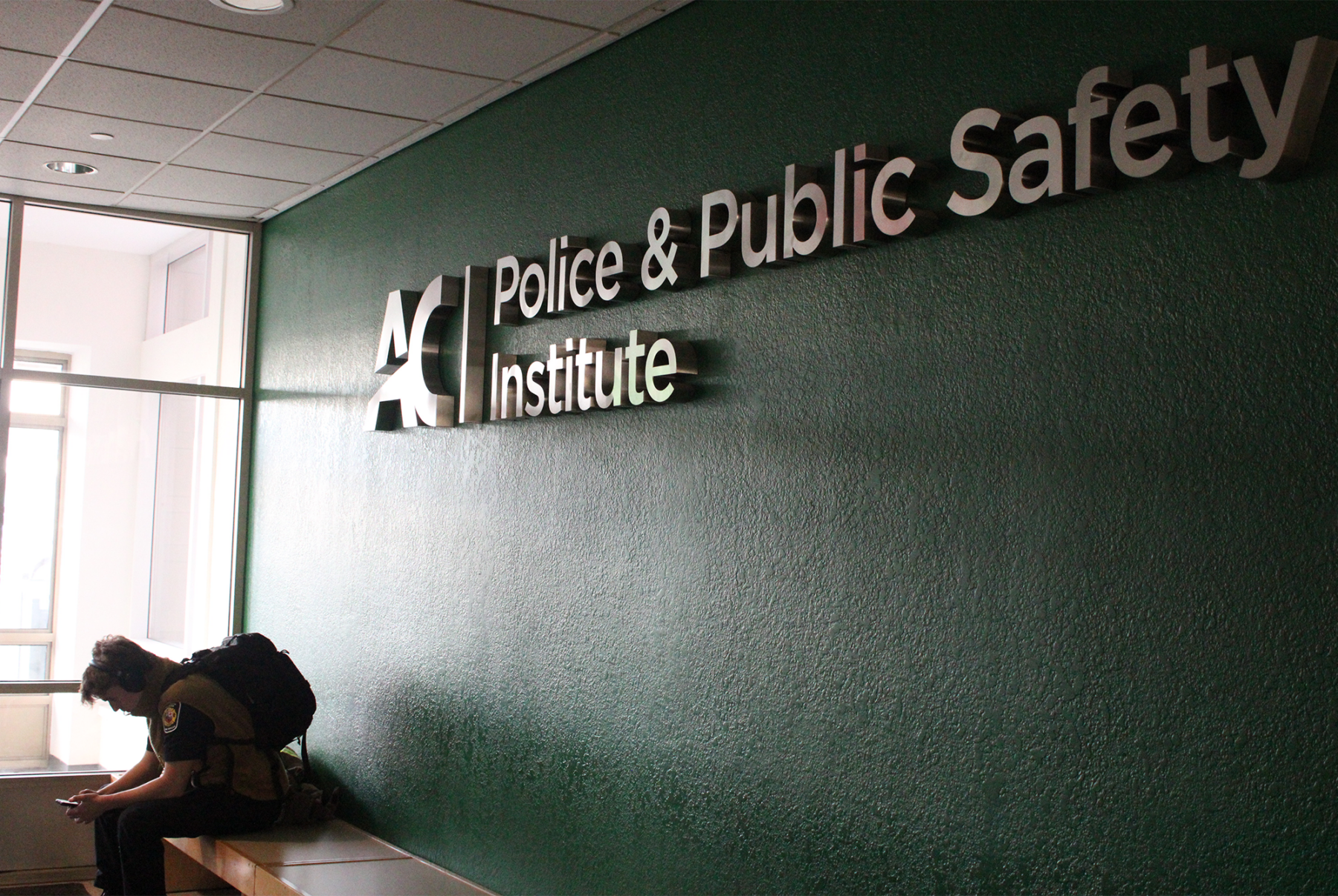 Police and Public Safety Institute sign located in P-building, where OPS currently has its training facility