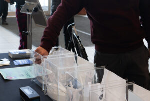 A student reaches into the mindful exercise box Monday afternoon.