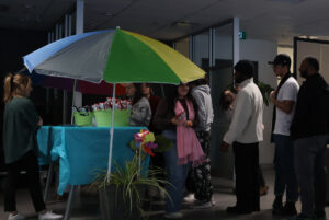 Students line up for snacks ten minutes before the movie.