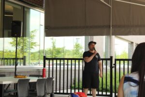 Adam Hadad kicks off karaoke night on the patio on June 19.