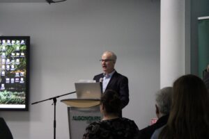 The director of the applied research program, Phillip Dawe begins launch event.