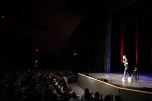 Paul Taylor performing to crowd of 500 at the Algonquin Commons Theatre.