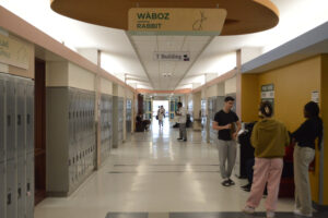 The hallway of J building showcasing some vibrant student activity