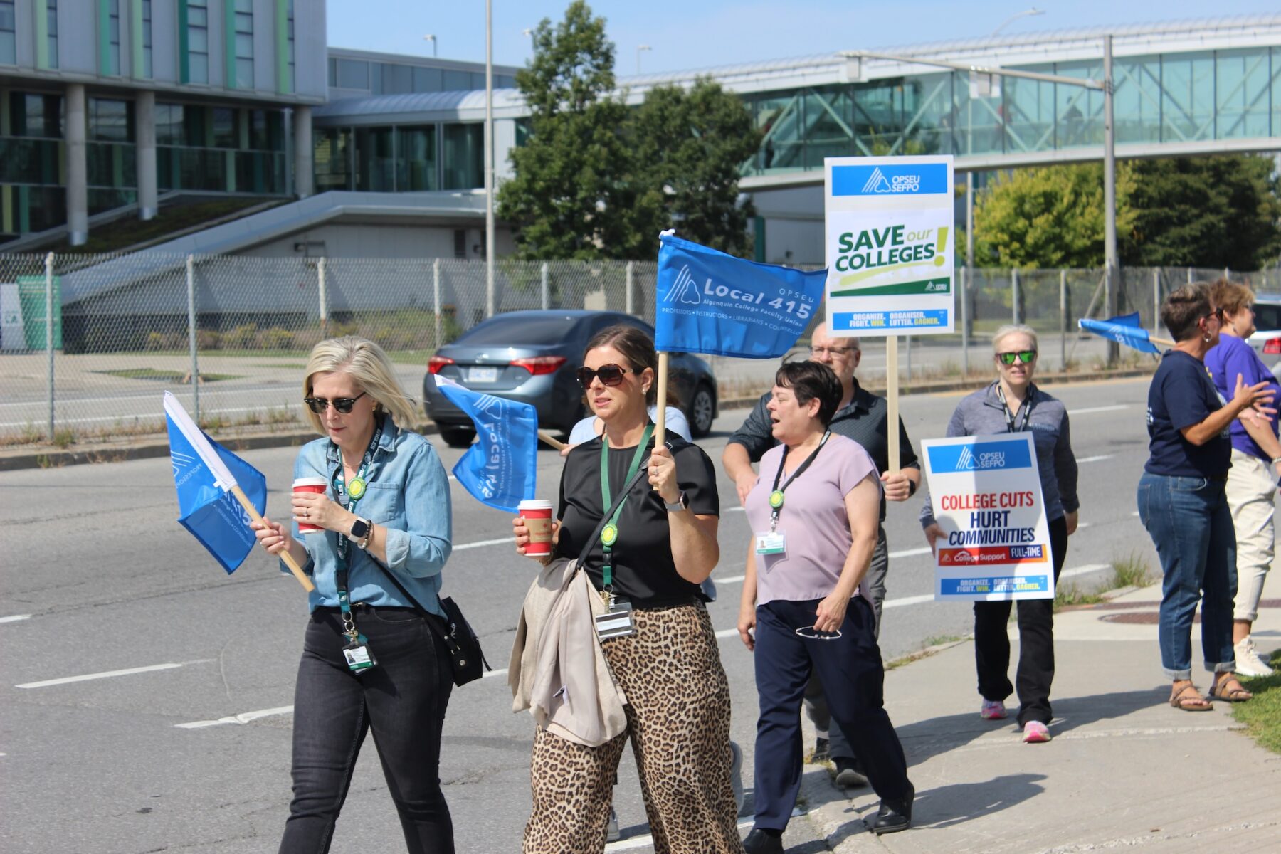 Algonquin College support staff walk along the practice picket line at Woodroffe Avenue on Sept. 10.