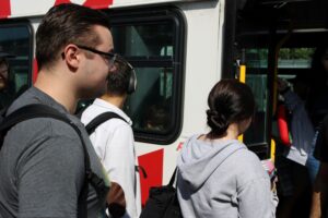 Robert Kemp boarding his bus at Baseline station. Kemp believes including the U-Pass in the college tuition is helpful for most students.