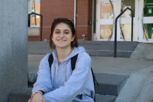 Isabelle Schwartz ssitting outside of N-building