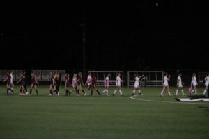 Algonquin Wolves Women's team shakes hands with Cambrian Women's team at Algonquin Sports Field on September 19, 2025,
