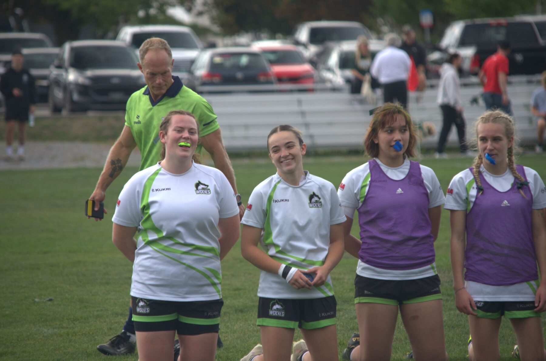 Wolves players take a breather awaiting their next substitution on Sept. 13 in Belleville.