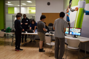 Competitors and TOs are preparing the brackets and deciding who will be facing whom in the round robin.