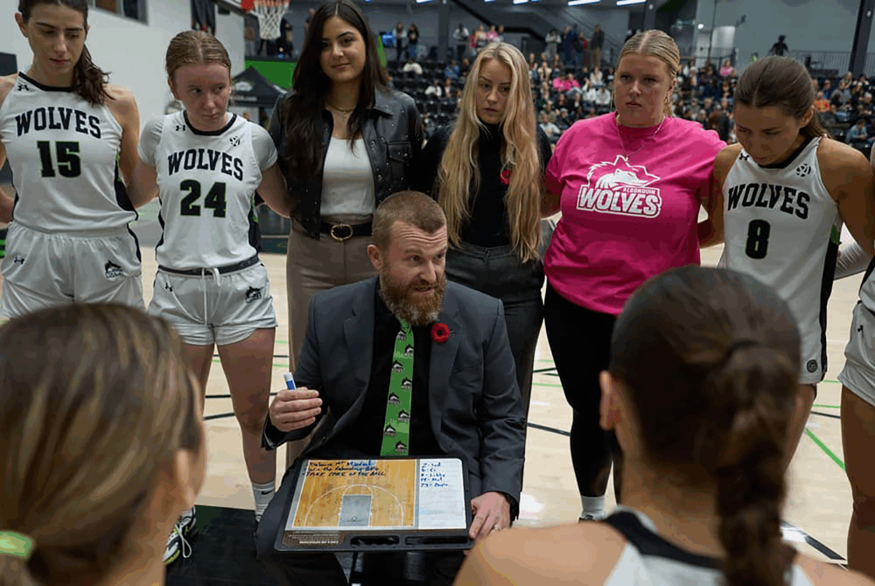 Algonquin Wolves head coach Jaime McLean speaks to his team during a timeout in an OCAA women’s basketball game at the Jack Doyle Athletics and Recreation Centre.