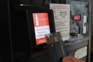 A student's card gets declined at a campus vending machine.