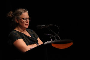 Kim Gray, an instructor in the practical nursing program speaking at the pinning ceremony.