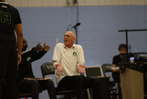 Coach Trevor Costello on the bench against the La Cité Coyotes on Oct. 22, frustrated with one of his players at La Cité's Main Campus Gym.