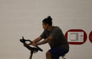 Albert Opena on a stationary bike at the Jack Doyle Athletic and Recreation Centre due to his ineligibility on Oct. 20.