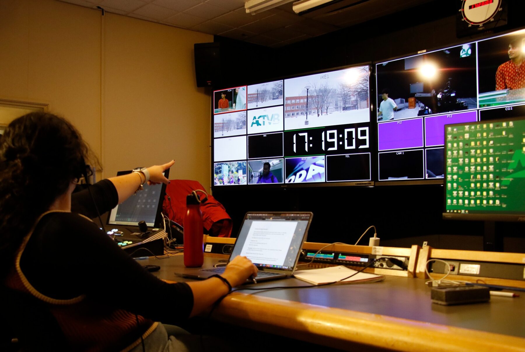 Isabela Arbache instructing classmates before a live broadcast on Oct. 8, 2025