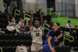 Cianah Miller watching her jumpshot sink into the rim Nov. 15 at the Jack Doyle Athletics Centre at Algonquin College.