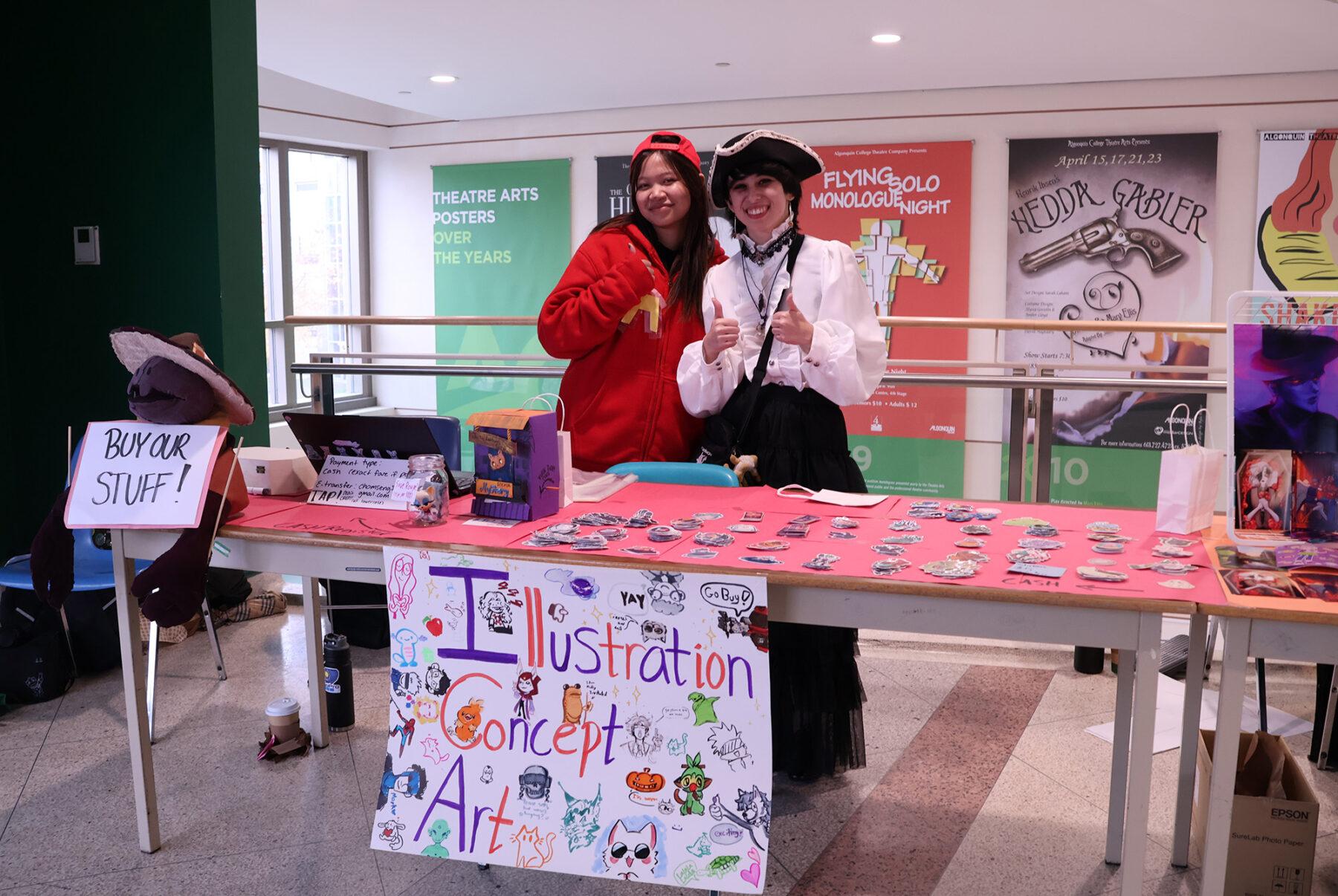 Sabella Chomseng (left) and Dustin Larocque wore costumes the day before Halloween at their fundraiser.