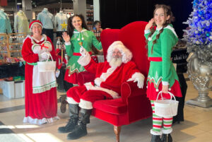 Santa Claus, Mrs. Claus and their elves added to the festive mood