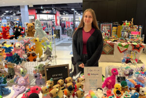 Amanda Cayen, a vendor who has come to the craft show a couple of years in a row, sells crocheted plushies.