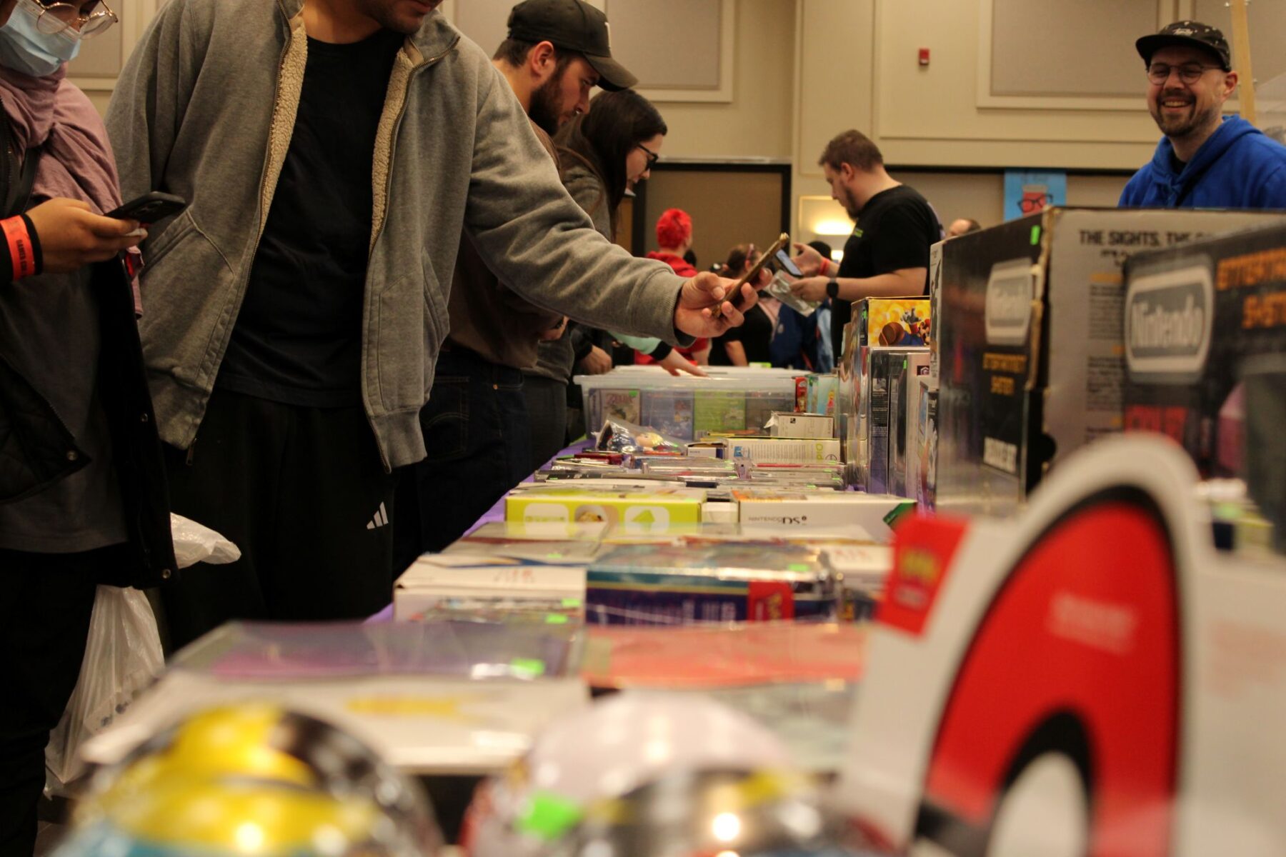 Long tables are filled with a wide variety of games, gaming devices and cards at this year's Gamer Con event.
