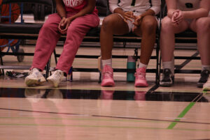 Players sported pink shoes for the game.