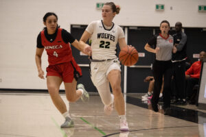 Taryn Mitchell drives before passing to a teammate on Friday, Nov. 28.