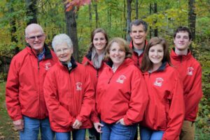 The three generations of the Thomas family stand together on their property in North Gower