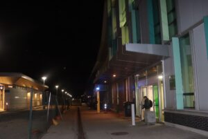 night time picture Dim lights and construction between the ACCE building and Baseline station