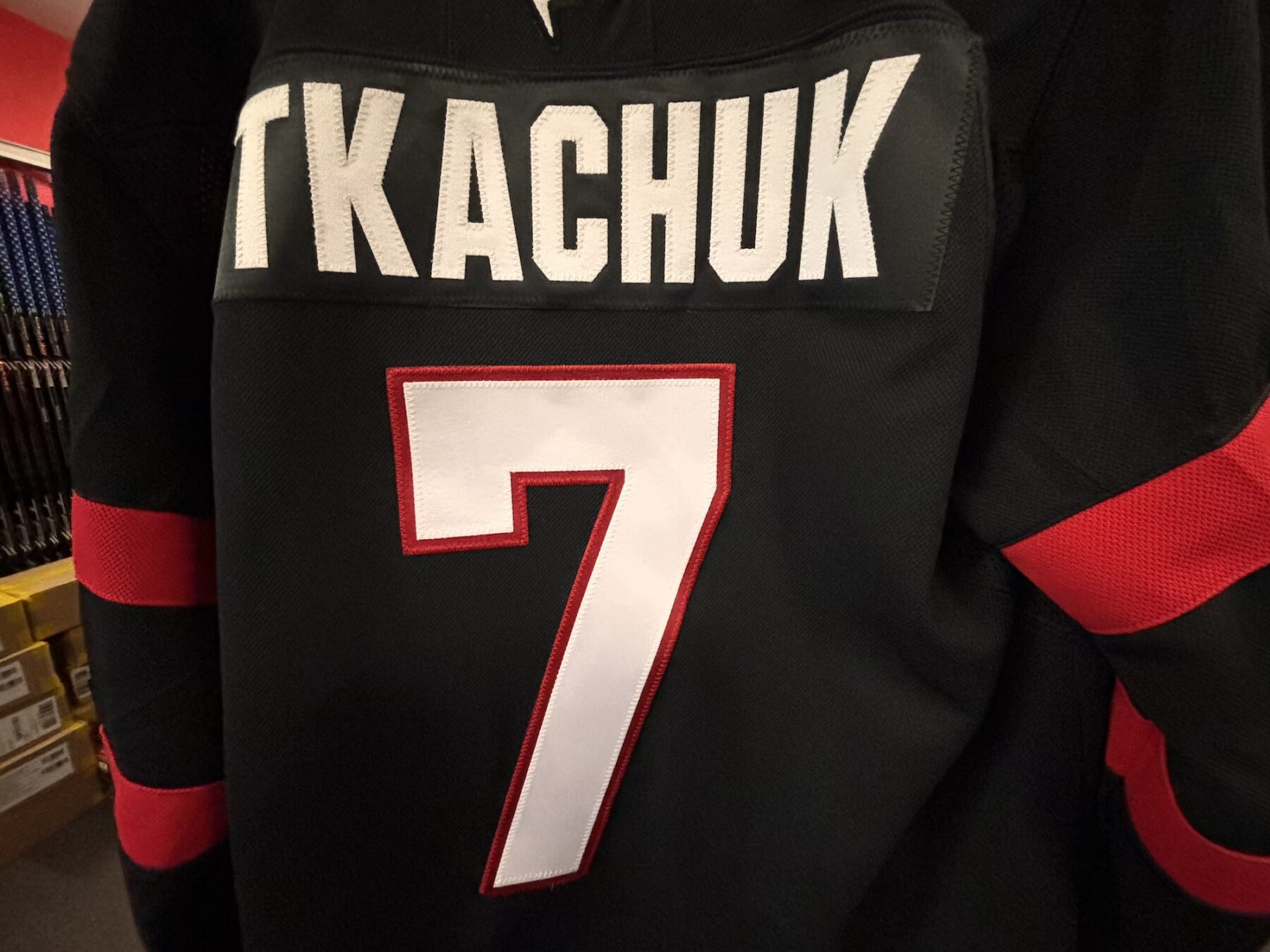 Brady Tkachuk Home Fanatics Authentic Jersey hanging at Valiquette's Source For Sports