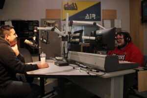 Radio students Tristan Escobar and Owen Landry on air talking sports.