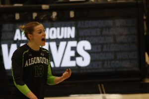 Wolves setter Gabbie Paquette motivating her team during the game at Jack Doyle Athletic Recreation Centre