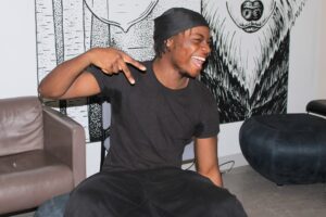 A student excitedly posing for the camera after the event.