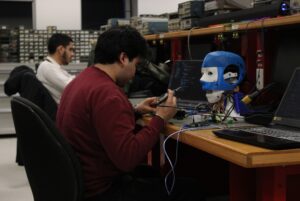 Mahmoud Hajoui (left), Miguel Fausto working on NIKO.