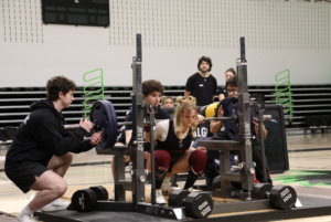 Ashley Driscoll squats 240lbs. at Algonquin Wolves' Powerlifting Competition on March 14.