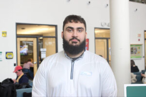 Elias Nasser posing for a picture during the Islamic Awareness week event, held in building E