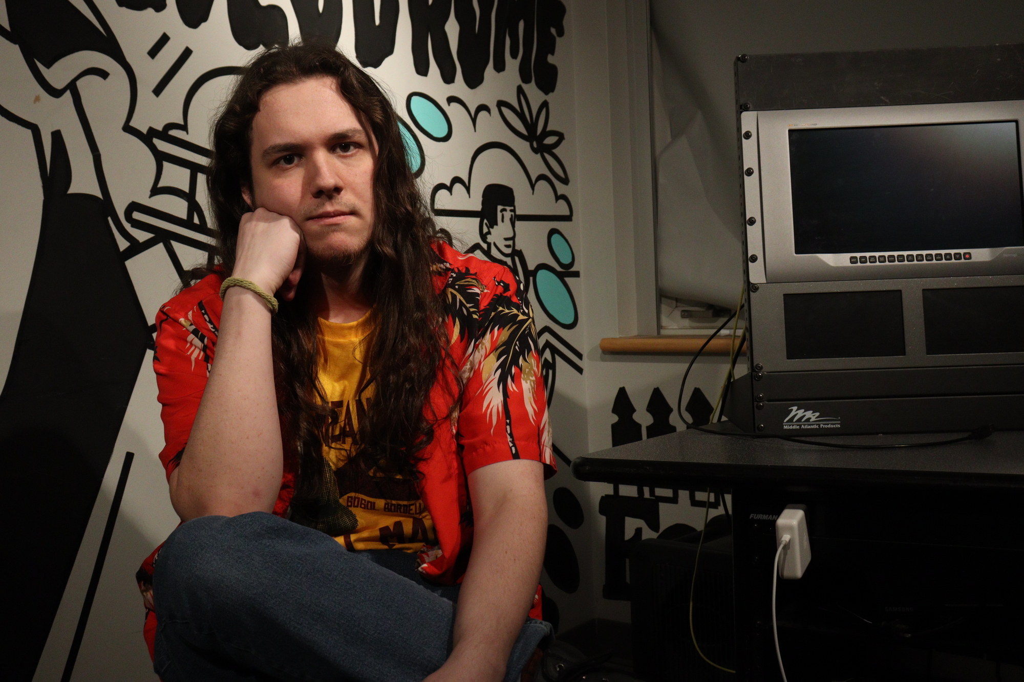 Jackson Bedard-McQuaig, a film and media production student, uses a Friday night as studio time. OSAP changes could affect enrolment in all programs, including his.