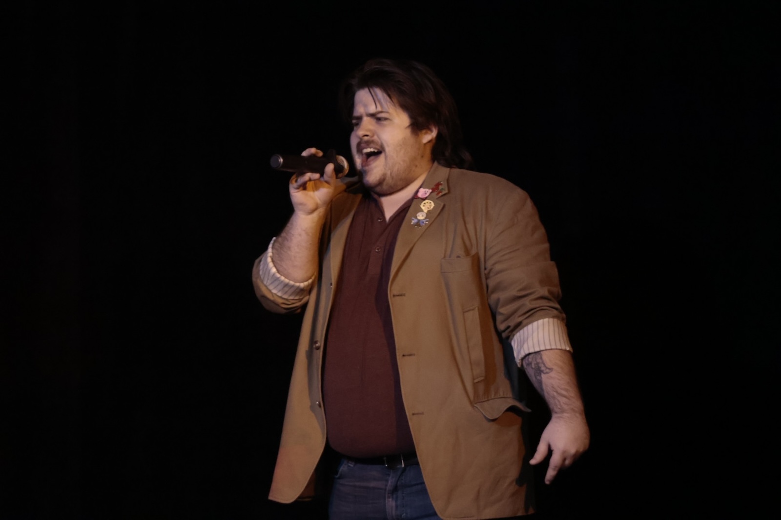 Cole Martin, singing along to 