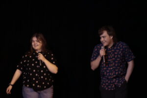 Emilie Leger (left) and Lucas Lebreche (right) singing along to Sincerely, me at the Observatory.