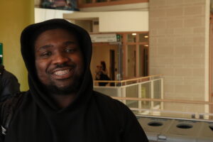 Tyress Cantave was running to catch his 88 Hurdman bus. Cantave was willing to express his uncertainty about completing his program with the OSAP changes in effect.