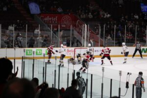 67's captain Cooper Foster celebrates with teammates after scoring go ahead goal at TD Place on April 14, 2026 during R2G3