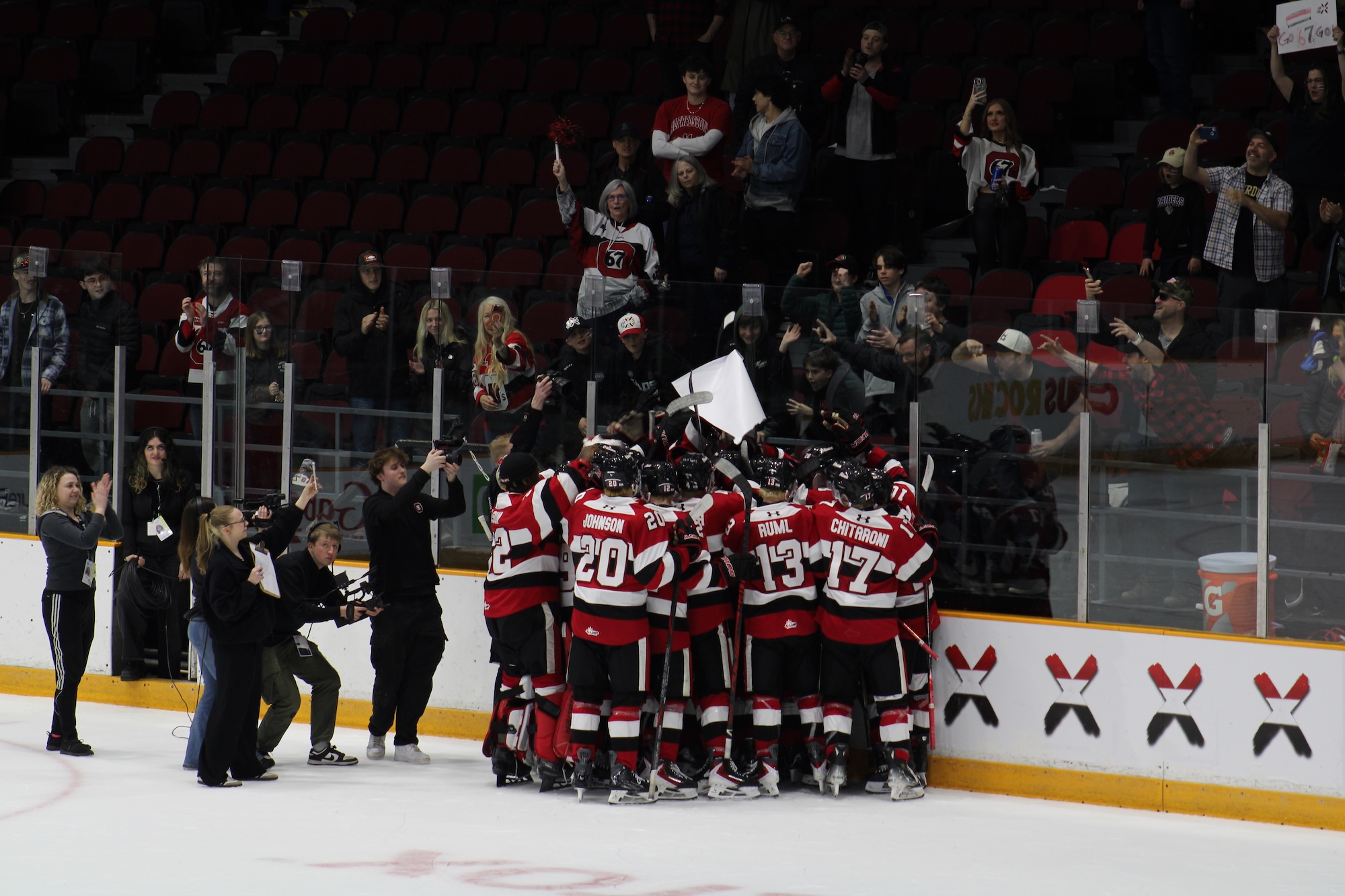 Ottawa 67's rip off X number five on boards at TD Place on April 15, 2026 after a Game 3 victory.