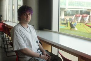 Samuel Morrison ate lunch in the Student Commons during AC Day 1 to beat the heat.